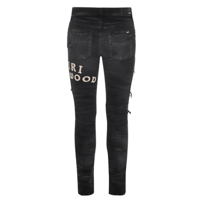 Amiri Hollywood Logo Repaired Jeans Black